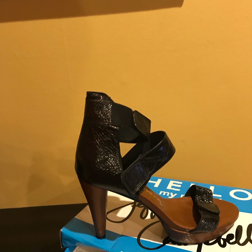 Black leather strapped  heel - slightly used